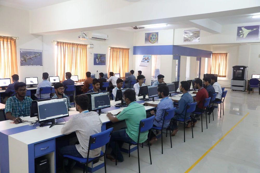 Mechanical engineering students developing 3D CAD models in a computer laboratory