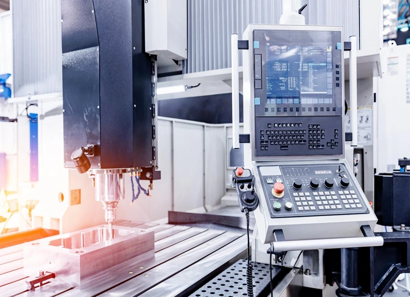 CNC milling machine manufacturing a precision mechanical engineering component